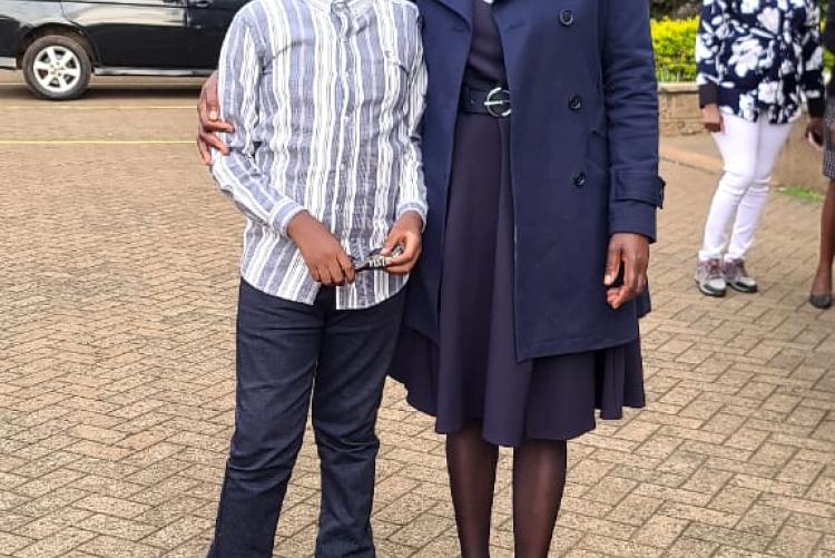 Ann retiree with her grandson