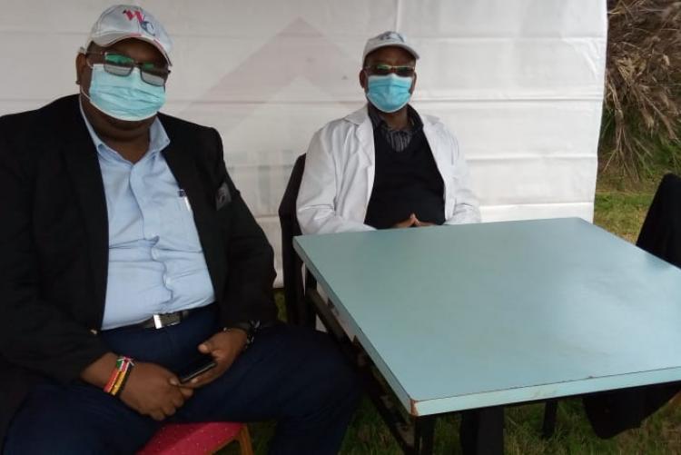 The Chief Internal Auditor Mr Kenneth Gitau with Mr Sammy Karanja an internal auditor following proceedings during the Tree planting exercise Wangari Mathai Institute